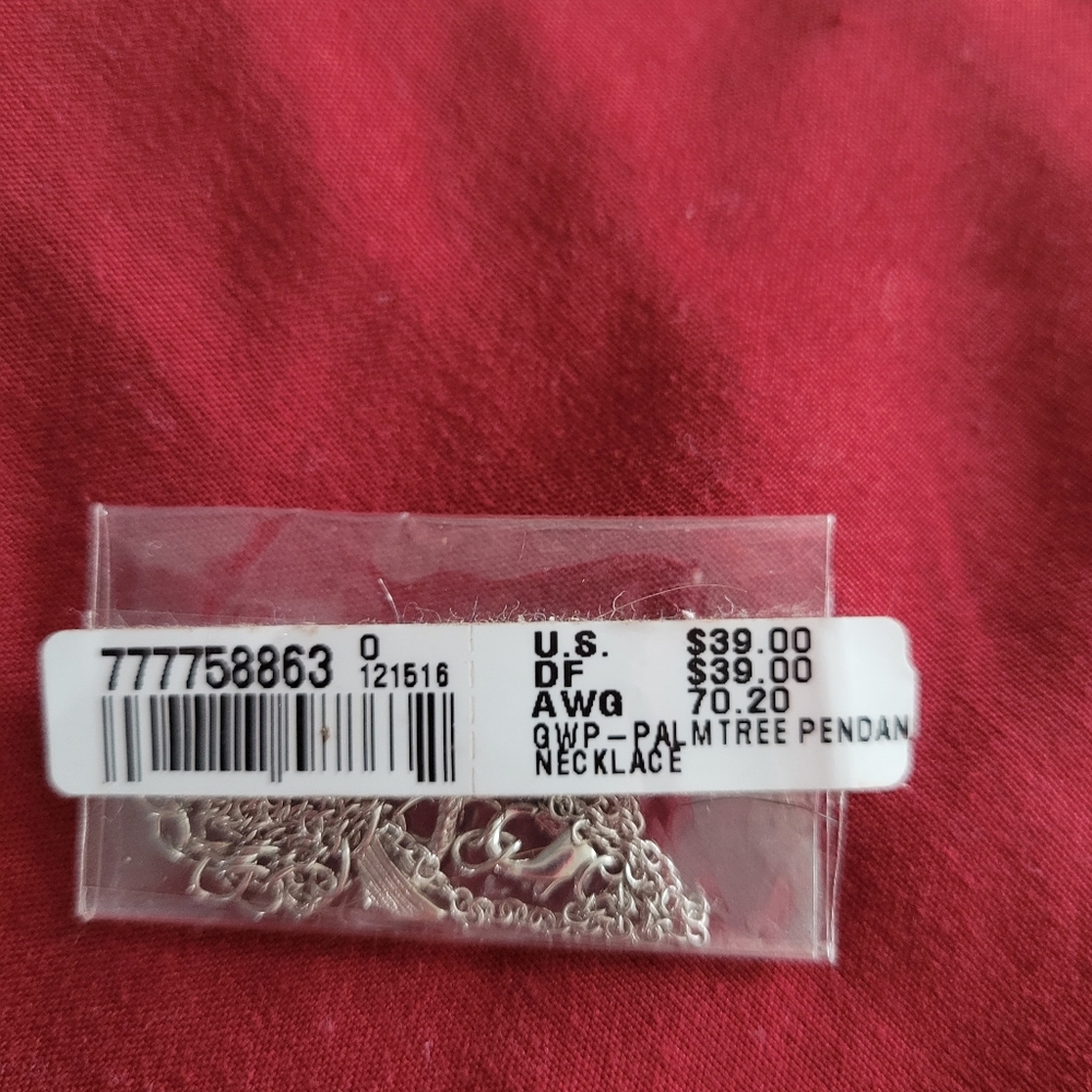 Silver colored necklace with palm tree - Picture 3 of 6